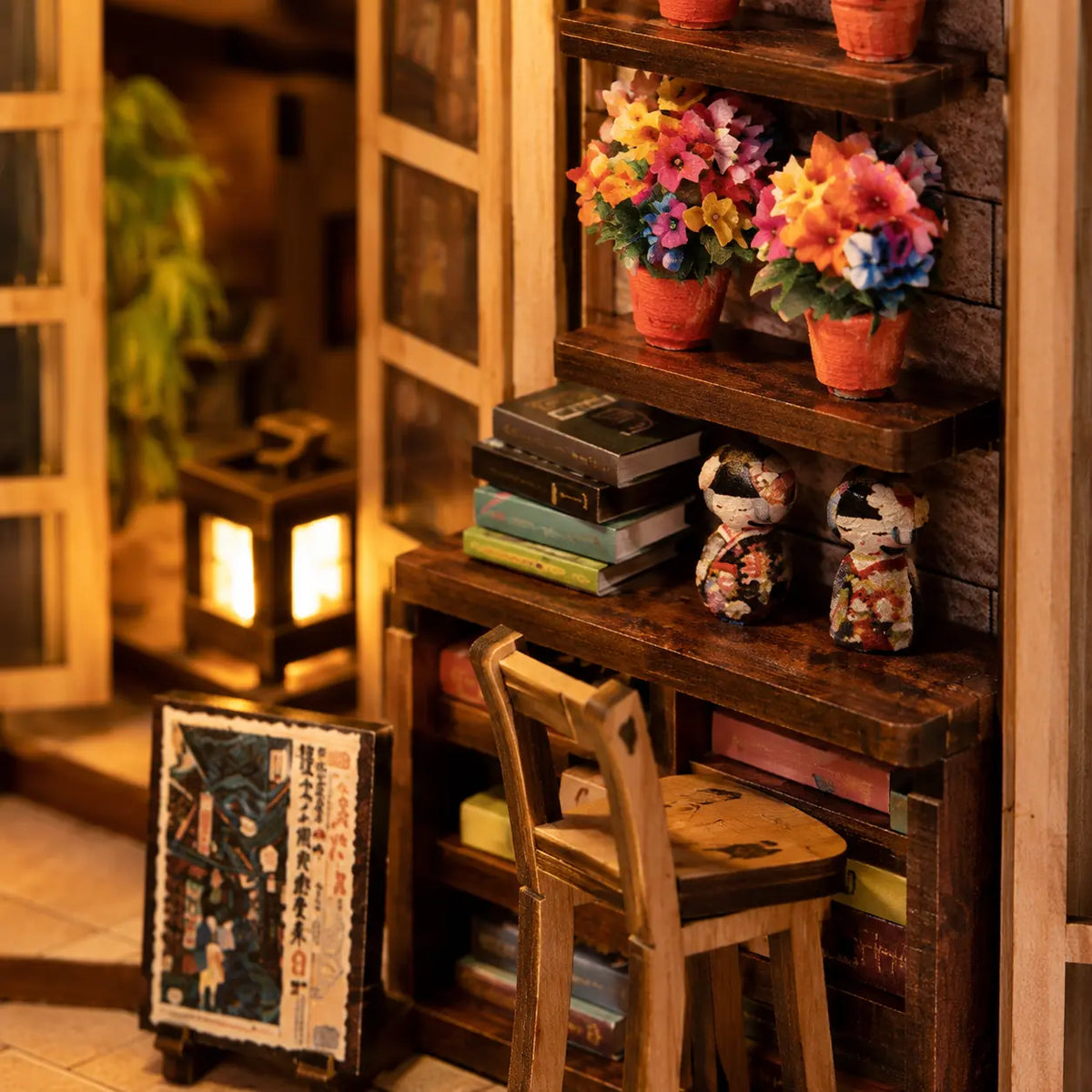 Flores, libros y figuras en miniatura del kit DIY